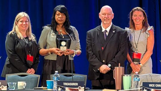 Nina Belli, Sherry Jones Leadership Award Recipient, Howard Wykes, and Caitlyn Bickford at the Annual Business Meeting